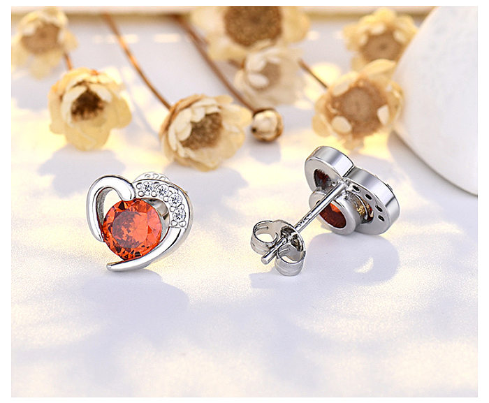 1 par de brincos femininos em forma de coração com incrustações de cobre e zircônia