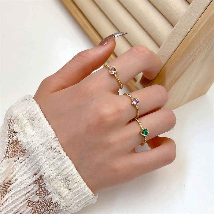 Anéis de zircão com incrustações de cobre e coração estilo IG