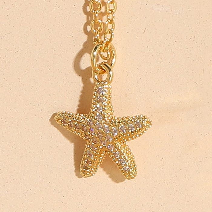 Colar com pingente banhado a ouro 14K com incrustação de cobre em concha de estrela do mar de praia