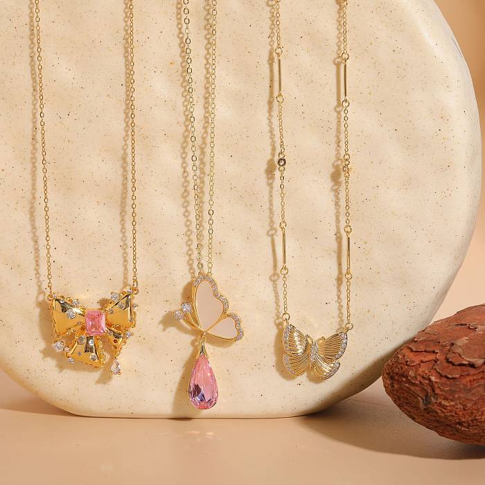 Lässige Damen-Halskette mit Schmetterlings-Schleifenknoten, Edelstahl, Kupfer, 14 Karat vergoldet, Muschel-Zirkon-Anhänger-Halskette in großen Mengen