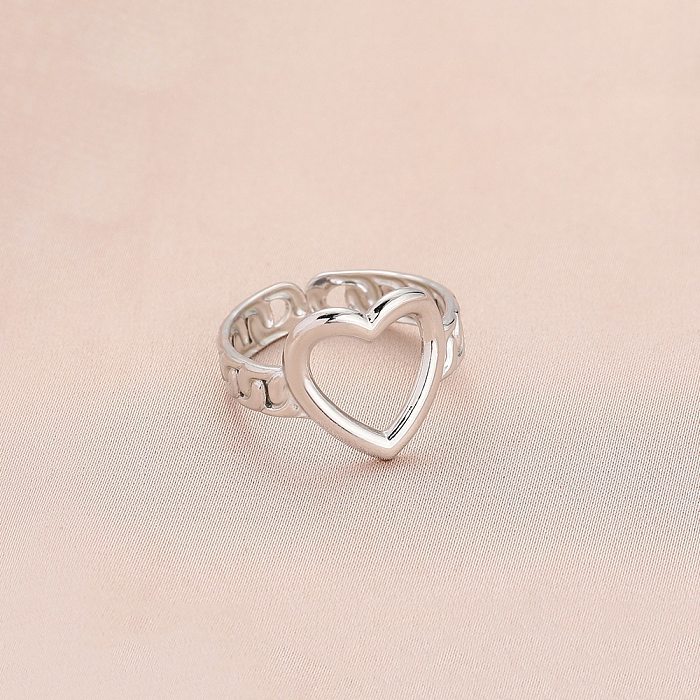 Novo estilo de anel de aço de titânio em forma de coração oco