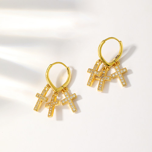 1 Paar coole Ohrringe mit Kreuzvergoldung, Inlay aus Kupfer und Zirkon, 18 Karat vergoldet