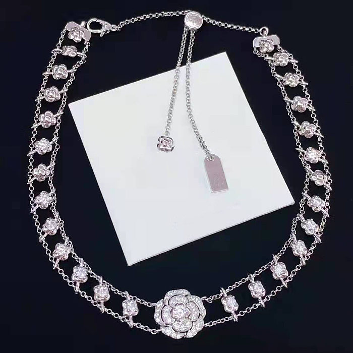 Luxuriöse Wassertropfen-Blume, Kupfer-Diamant, künstliche Edelsteine, Damen-Armbänder, Ohrringe, Halskette
