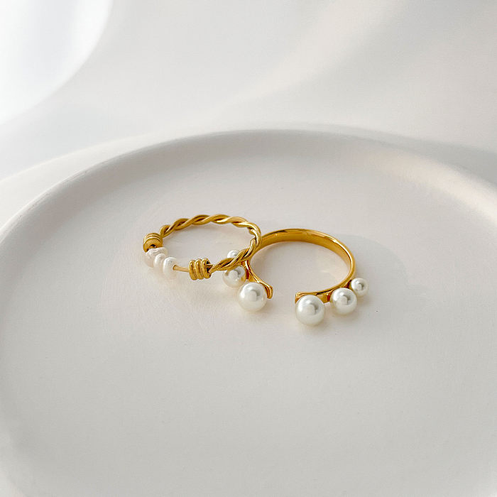 Geometrische Ringe im Vintage-Stil mit Titanstahl-Inlay und künstlichen Perlen