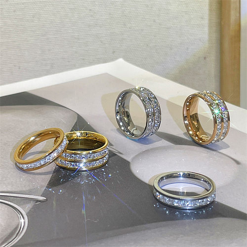 Glänzende, runde, mit Titanstahl überzogene Inlay-Ringe mit künstlichen Diamanten