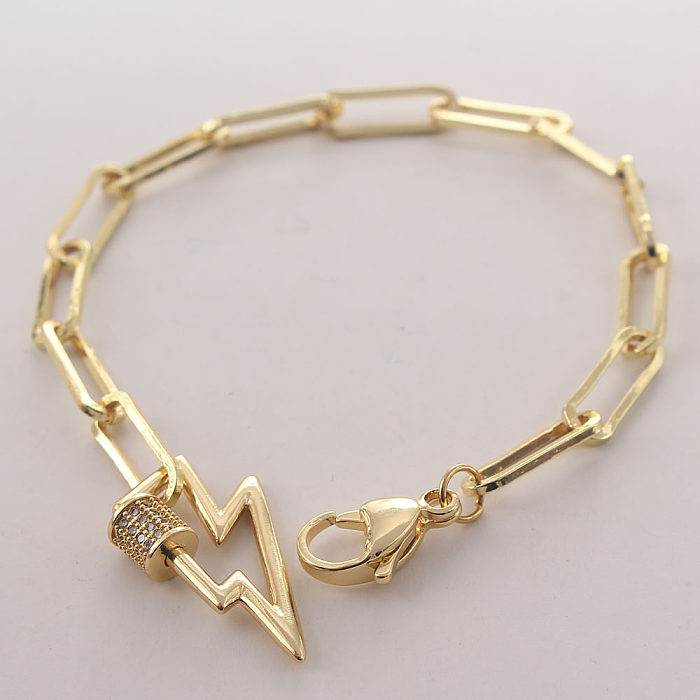 Pulseras chapadas en oro con circonitas de cobre en forma de corazón de mano de estilo simple