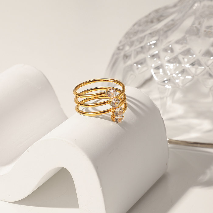Europäischer und amerikanischer Ring aus 4 Karat vergoldetem Edelstahl mit 18 Diamanten aus weißem Zirkonium und offenem Schmuck