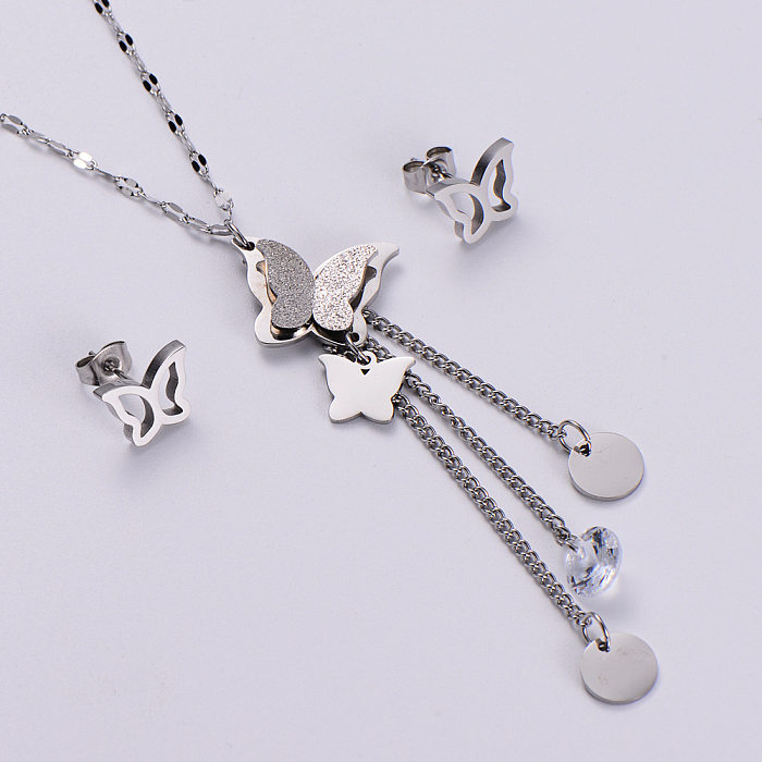 Conjunto de pendientes de collar de acero inoxidable con incrustaciones de circonio con borla de mariposa exquisita a la moda