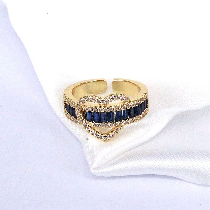 INS-Stil, eleganter, modischer, herzförmiger, verkupferter, offener Ring mit Inlay aus Zirkon und vergoldetem Zirkon