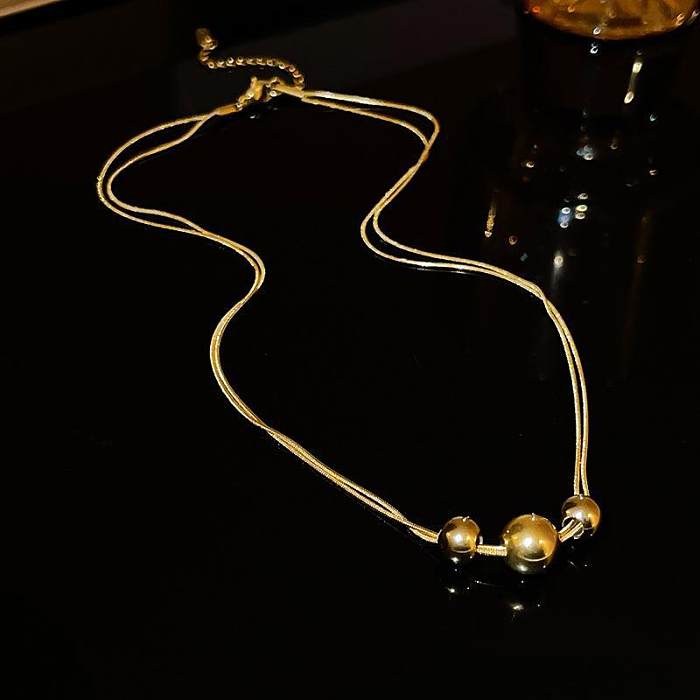 Elegante Halskette mit Anhänger in Herzform mit Schleife und Kupfereinlage und Zirkon