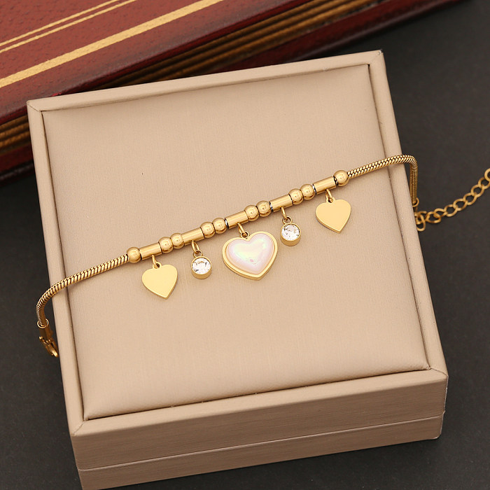 Elegante formato de coração chapeamento de aço inoxidável incrustado pulseiras brincos colar