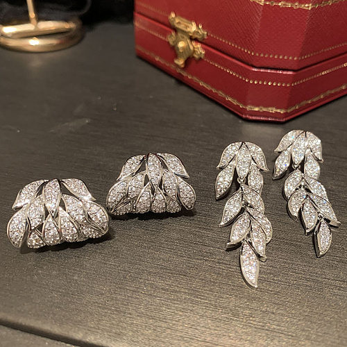 Modische, schlichte Ohrringe mit Blumen-Kupfer-Inlay und Zirkon