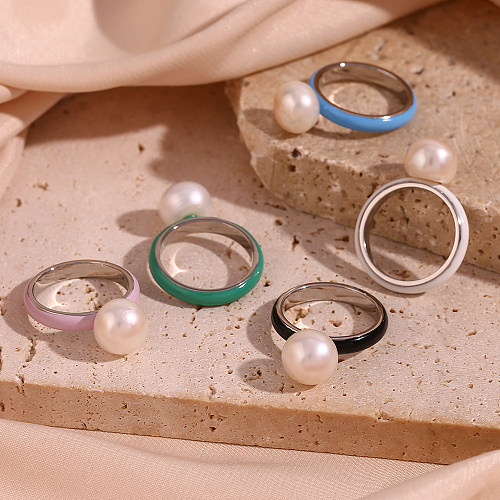 Anneaux de perles incrustés en acier inoxydable rond de style simple