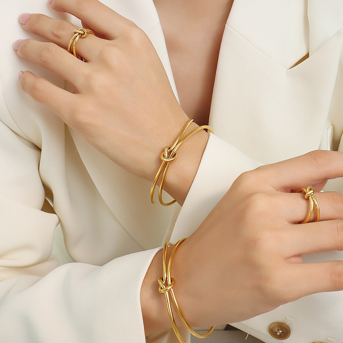 Pulseiras de anéis banhados a ouro 18K com chapeamento de aço de titânio geométrico elegante