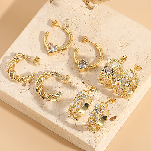 1 par elegante luxuoso estilo clássico formato de coração cobre assimétrico chapeamento incrustação zircão 14K brincos banhados a ouro