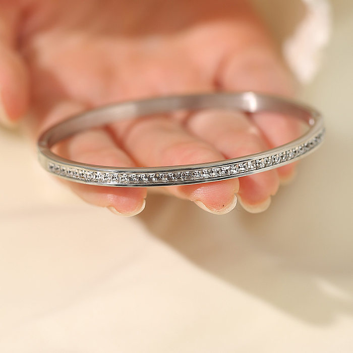 Pulseras de anillos de diamantes de imitación con incrustaciones de acero de titanio de color sólido de estilo simple