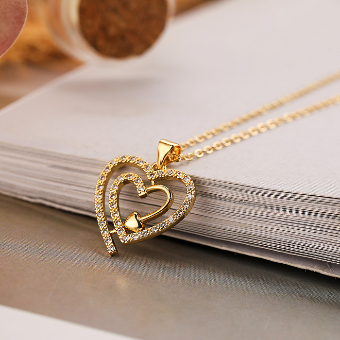 Elegante collar con colgante chapado en oro de 18 quilates con incrustaciones de cobre y forma de corazón de Streetwear