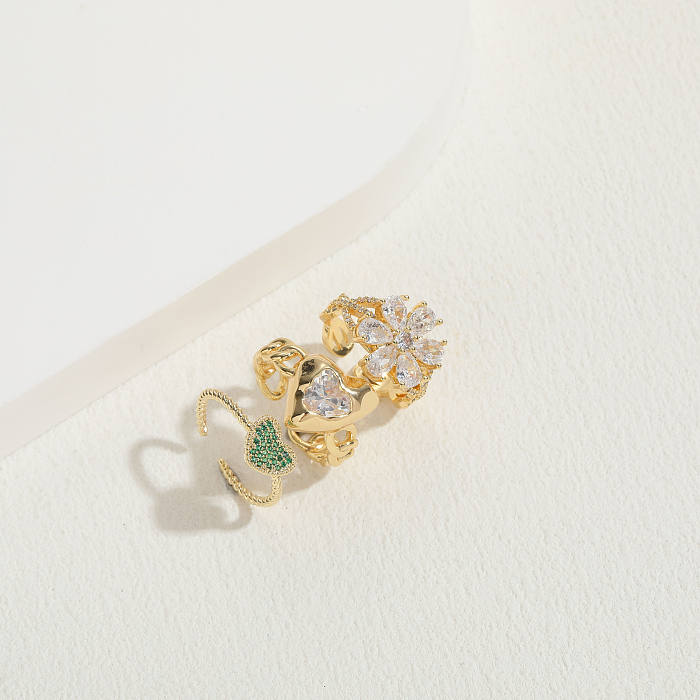 Elegante, luxuriöse, klassische Herzform-Blumen-Verkupferungs-Inlay-Zirkon-Ringe mit 14-Karat-Vergoldung