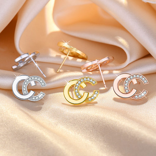 Pendientes tipo botón con diamantes de imitación chapados en oro y cobre con letras de estilo simple, 1 par