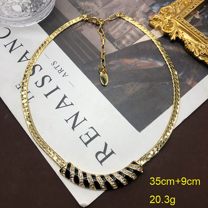 Collar de pendientes y anillos chapados en oro con incrustaciones de cobre y rayas en espiral redondas de estilo vintage