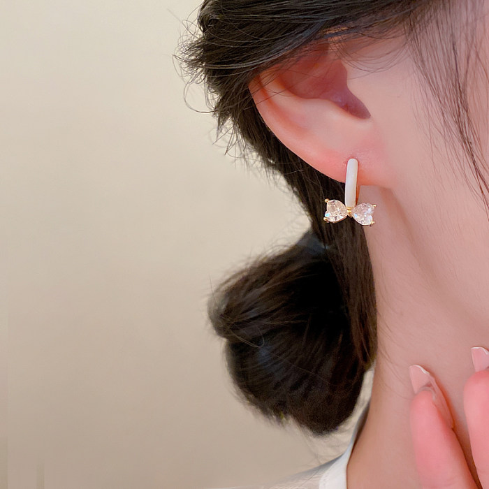 1 Pair Sweet Korean Style Bow Knot Enamel Inlay Copper Zircon Earrings