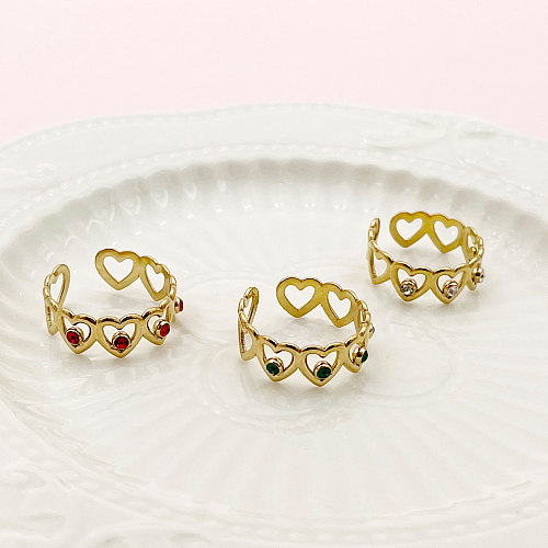 Anillos chapados en oro de diamantes de imitación con incrustaciones de revestimiento de acero inoxidable en forma de corazón de estilo simple