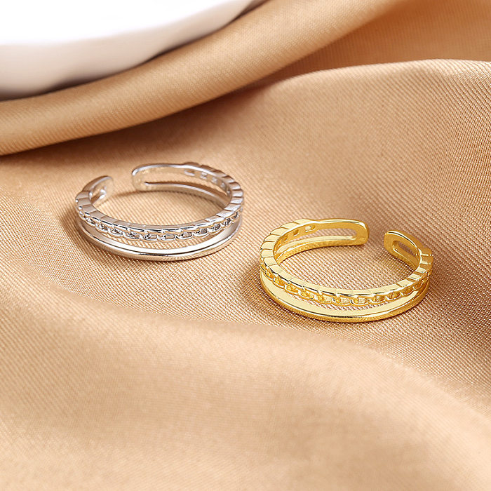 Einfacher offener Ring mit geometrischer Polierkette aus Kupfer