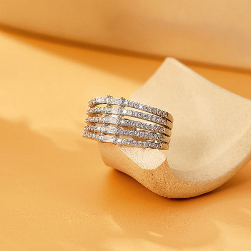 Comute anéis banhados a ouro branco de zircão em camadas de cobre de cor sólida