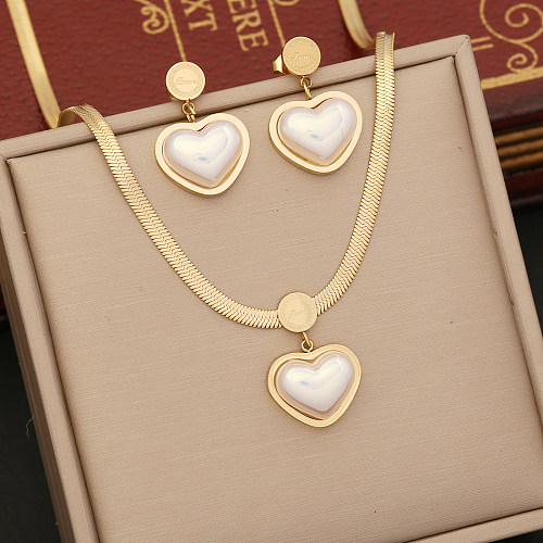 Venta al por mayor elegante collar de pendientes de pulseras de perlas de acero inoxidable con forma de corazón