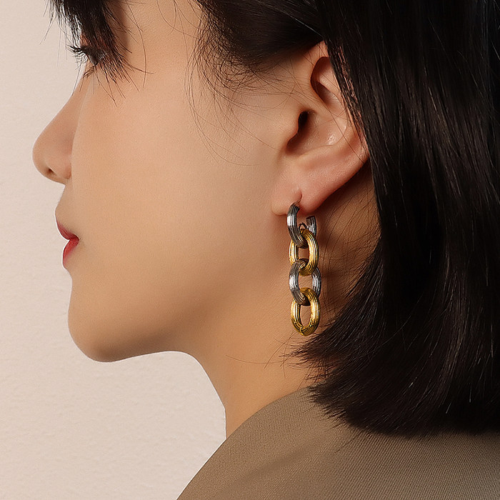 Boucles d'oreilles plaquées or 18 carats en acier titane ovale rétro
