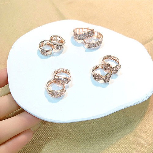 1 Paar süße, glänzende herzförmige Schleife-Knoten-Überzug-Inlay-Kupfer-Zirkon-Ohrringe mit Rosévergoldung