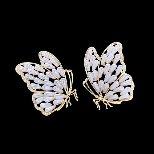 1 paire de boucles d'oreilles papillon en cuivre de Style classique pour femme