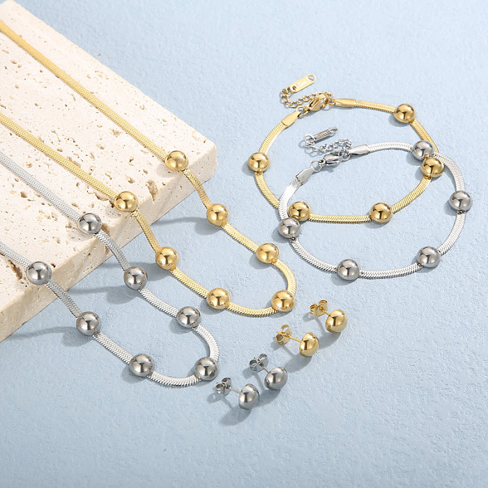 Collier de boucles d'oreilles de bracelets plaqués or 18 carats de placage d'acier de titane géométrique de vacances décontractées