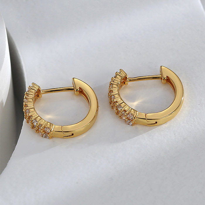 1 Paar lässige geometrische Überzug-Inlay-Kupfer-Zirkon-18-Karat-vergoldete Ohrringe