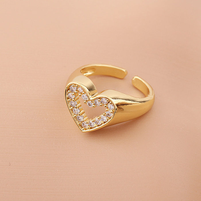 Anel aberto de cobre em formato de coração fashion com zircão embutido