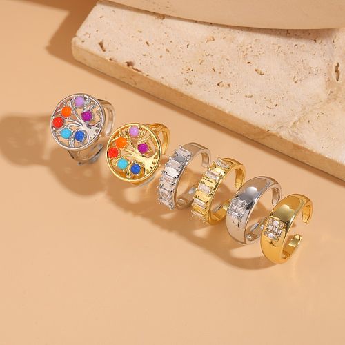 Elegante offene Ringe im klassischen Stil mit geometrischer Verkupferung und Inlay aus Zirkon mit 14-Karat-Vergoldung