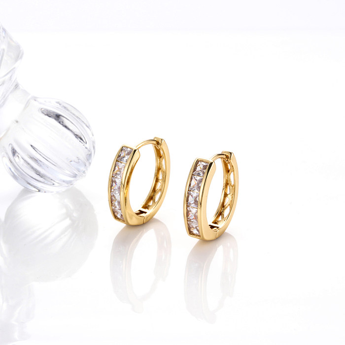 1 Paar glänzende, runde, herzförmige, verkupferte Inlay-Diamant-Ohrringe mit 18-Karat-Vergoldung