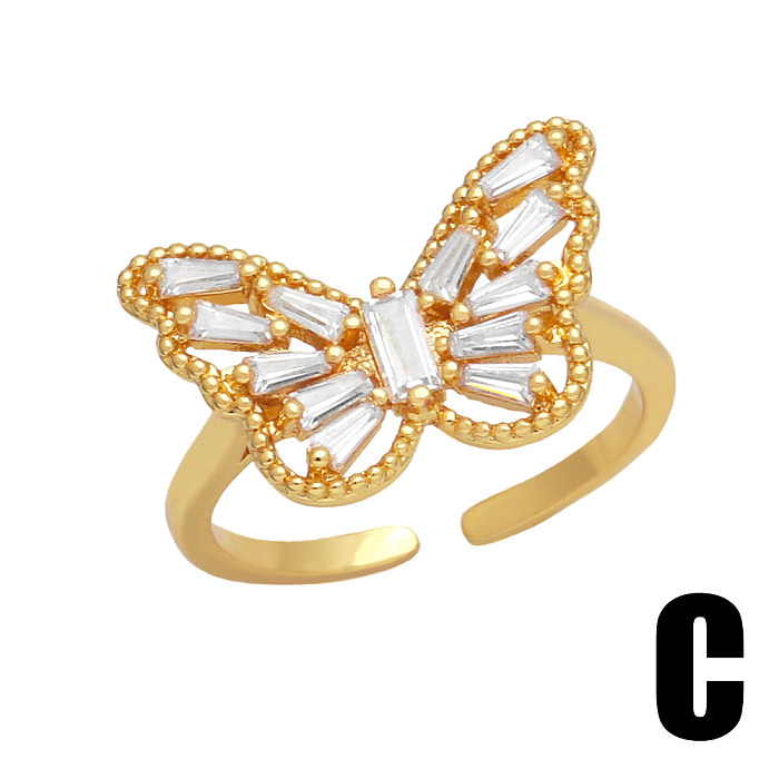 O ouro do cobre 18K da borboleta da forma do coração do estilo do INS chapeou o anel aberto do zircão no volume