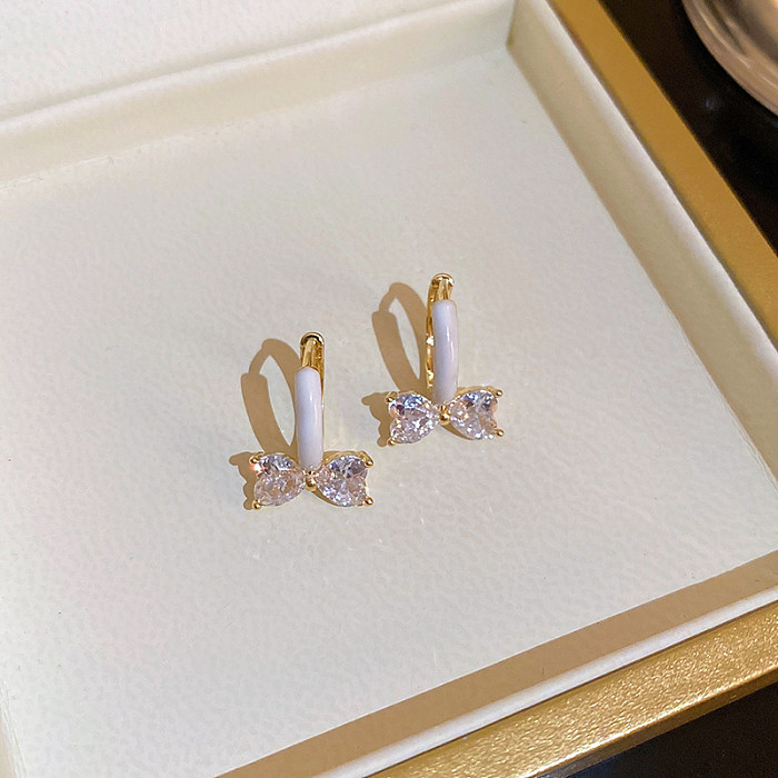 1 Pair Sweet Korean Style Bow Knot Enamel Inlay Copper Zircon Earrings