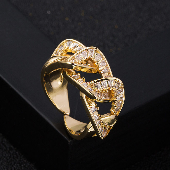 Modischer, verkupferter, offener Ring aus 18-karätigem Gold mit Mikrobesatz und Zirkonkette