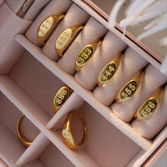Anneaux plaqués or 18 carats en acier inoxydable avec lettre de trajet exagérée en vrac