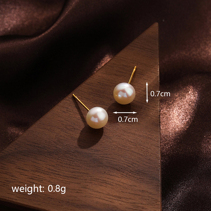 1 par de aretes chapados en oro de 18 quilates con revestimiento de perlas geométricas de estilo simple e informal