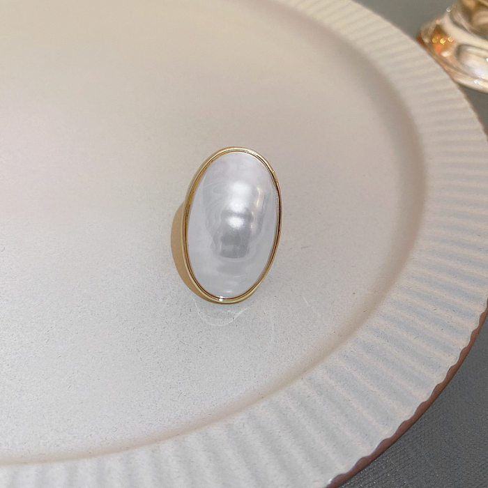 Colar de anéis de pérola com incrustação de cobre oval da moda, 1 peça