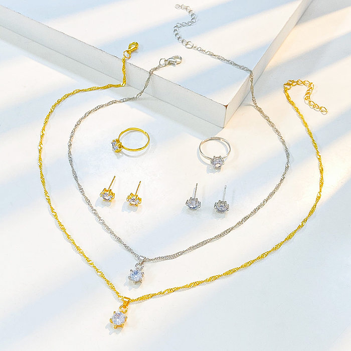 Elegante, glamouröse, geometrische Kupfer-Inlay-Zirkon-14-Karat-vergoldete Ringe-Ohrring-Halskette