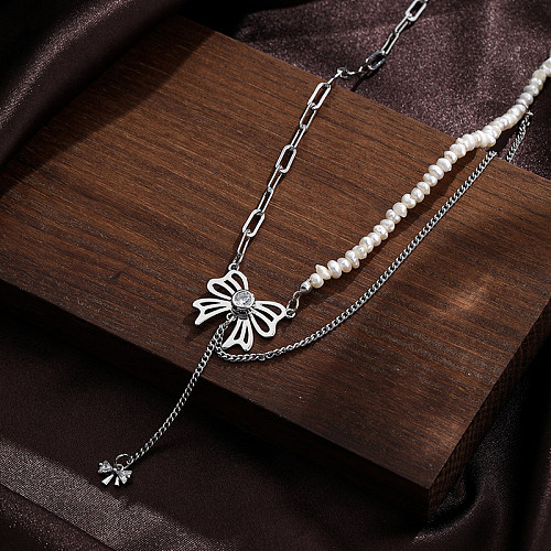 Lässiger schlichter Stil mit Schleife, Knoten, Kupfer, Perlenbeschichtung, Intarsien, Strasssteine, versilberte Anhänger-Halskette