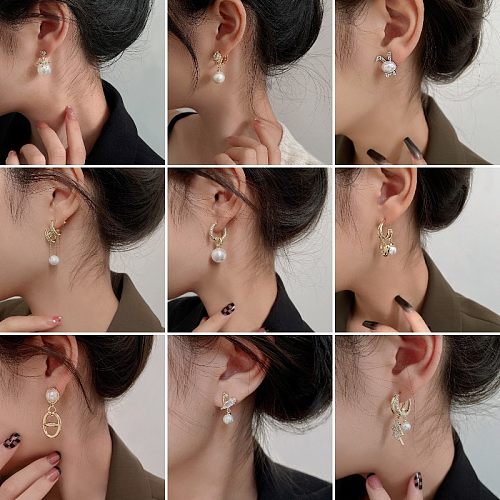 1 paire de boucles d'oreilles élégantes avec incrustation de nœud papillon en métal, cuivre, perle et Zircon