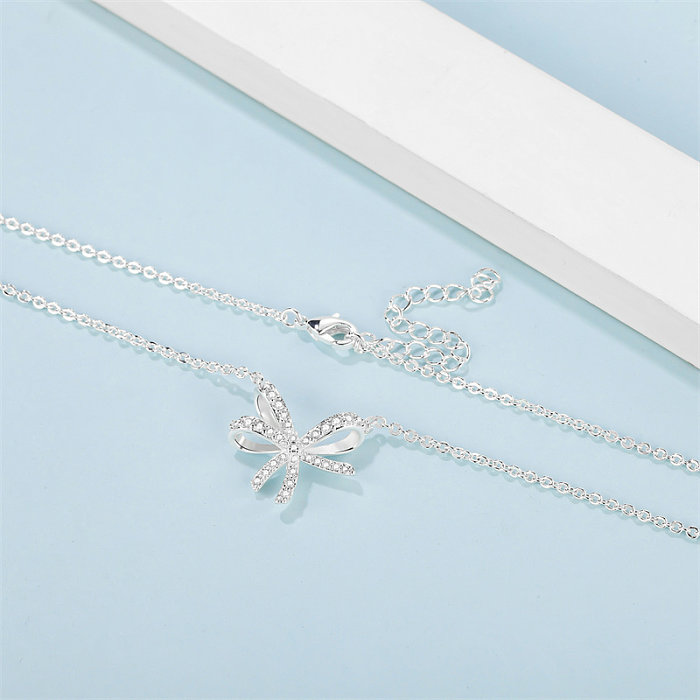 Elegant Simple Style Bow Knot Copper Silver Plated Zircon Pendant Necklace In Bulk
