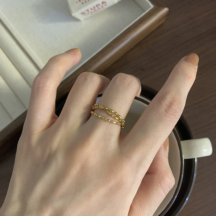 Anéis chapeados do aço 18K do titânio da cor sólida do estilo ouro moderno no volume
