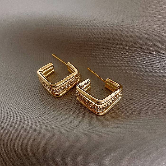Clous d'oreilles élégants carrés en cuivre plaqué or avec strass, 1 paire