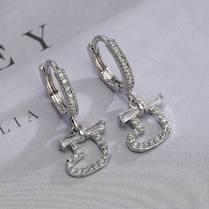 1 paire de boucles d'oreilles pendantes en forme de cœur, Style Simple et doux, incrustation de nœud papillon en cuivre et Zircon plaqué or 18 carats
